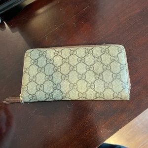Authentic Gucci zip around wallet